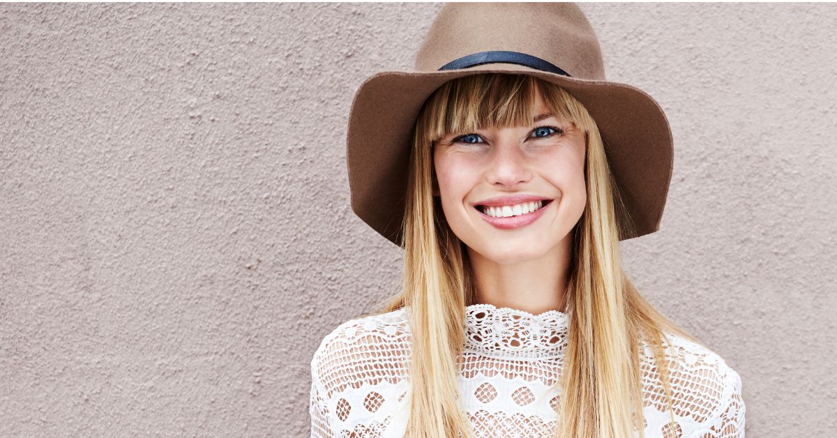 Secret to better skin A happy smiling woman with beautiful skin - The Secret to Better Skin is Consistency