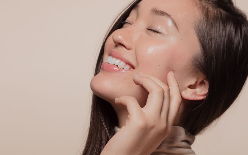 Woman with glowing skin – Korean Glass Skin Facial Introductory Offer