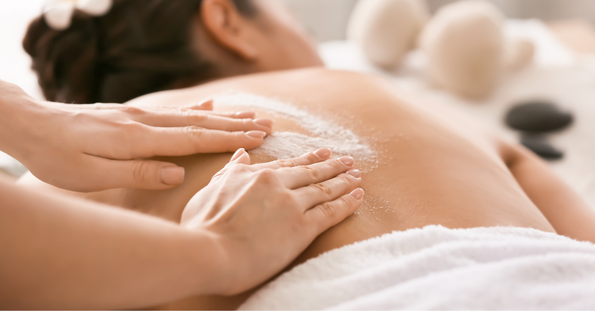 Back Treatment Close-up of exfoliant being applied to someone's back.